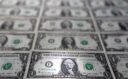 Dollar stumbles as markets reassess rate bets, eye ECB