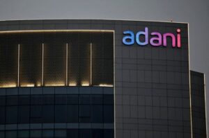 Some Adani shares climb, after group's market losses top $110 billion