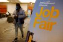 US weekly jobless claims rise moderately; fourth-quarter GDP trimmed