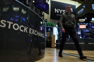 Wall St gains as bank fears fade, focus on inflation data