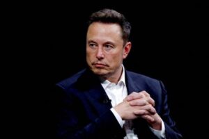 Elon Musk pursues self-driving approval on China trip as Tesla wins key endorsement