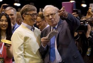 Buffett takes stage at Berkshire meeting, pays tribute to Munger, cuts Apple stake