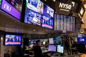 Wall St opens lower as megacaps drag