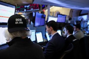 Dow ends above 40,000 milestone, indexes notch up weekly gains