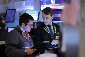 Wall St opens lower after economic data