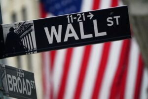 Wall Street advances as investors eye economic data, Fed comments