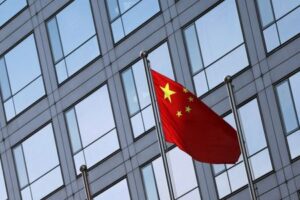China securities regulator vows to strengthen oversight, resolve risks