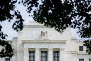 Fed officials steer cautiously toward potential rate cuts