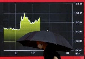 Asia shares set for five-month winning streak; yen slides