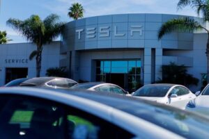 Morning Bid: New records as jobs scanned, Tesla jumps