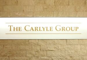 Carlyle in talks to buy Baxter's kidney care unit, source says