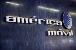 America Movil swings to net loss citing post-election peso volatility