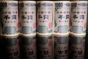 Yen surges on possible intervention, sterling hits one-year high