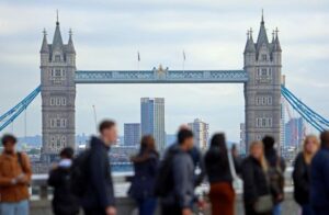 UK pay growth slows but remains high for Bank of England