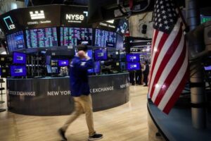 Stocks end lower, Nasdaq confirms correction as recession fears mount