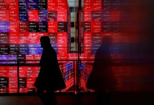 Stocks trampled, Nikkei tumbles past Black Monday milestone