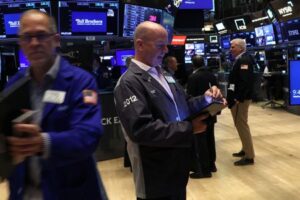 Wall Street closes up on tech boost; inflation data dents hopes for big Fed rate cut