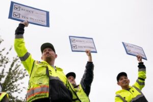 Boeing workers line up to vote on contract, could strike on Friday