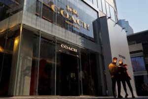 US sues to block merger of Coach and Michael Kors handbag makers