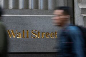 Wall St slips as higher yields offset upbeat corporate earnings