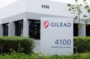 Gilead posts quarterly loss on acquisition charge, revenue rises 5%