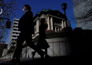 BOJ keeps ultra-low rates, sees inflation staying near target