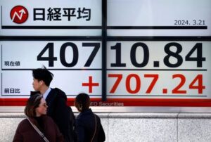 Global stocks gain on Big Tech lift; yen swings to fresh 34-yr low