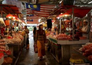 Malaysia's economy grows faster than expected, inflation risks cloud outlook