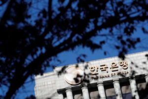 South Korea extends rate pause, raises growth outlook