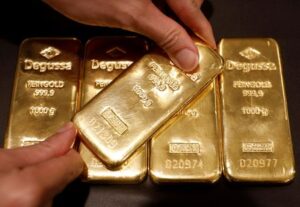 China's central bank to return to gold buying as prices ease, analysts say