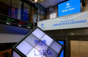 FTSE 100 advances as more earnings roll in; UK wage growth slows