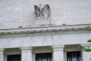 US interest rate futures price in inter-meeting Fed cut