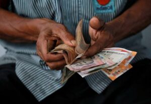 Indian rupee declines to all-time low on heavy dollar demand