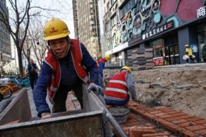 China's 1st quarter growth solid but March data shows demand still feeble