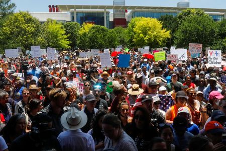 Protests at NRA convention in Texas, but speakers reject new gun laws