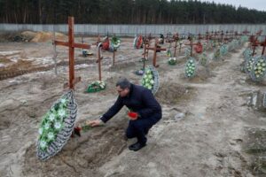 Recalling Bucha deaths, Zelenskiy describes 'horrific' year in Kyiv region